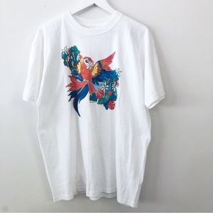 White parrot graphic T-shirt size large